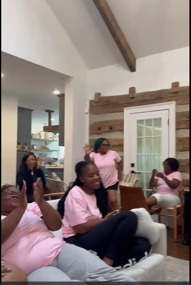 Women praising together in the retreat living room